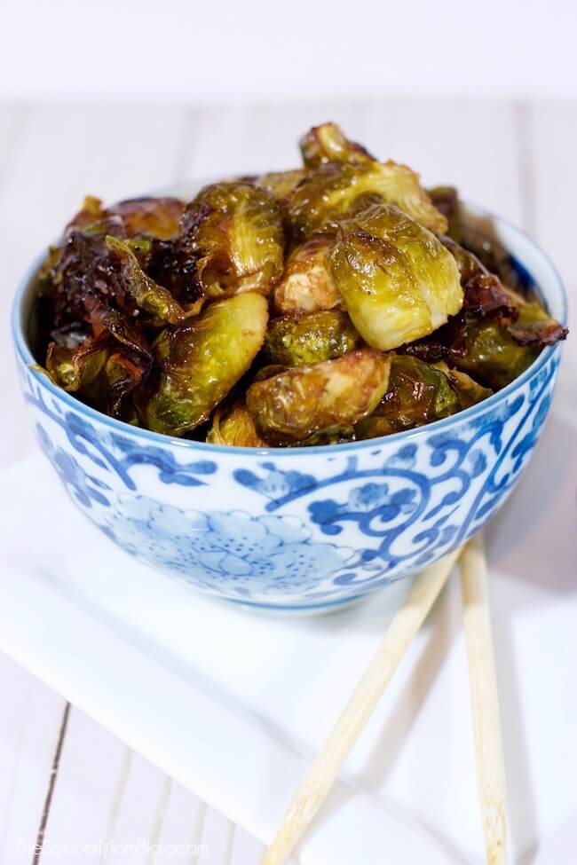 bowl of roasted brussels sprouts in a soy glaze.