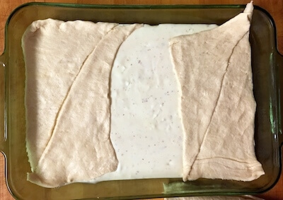 making sopapilla cheesecake bars with crescent dough