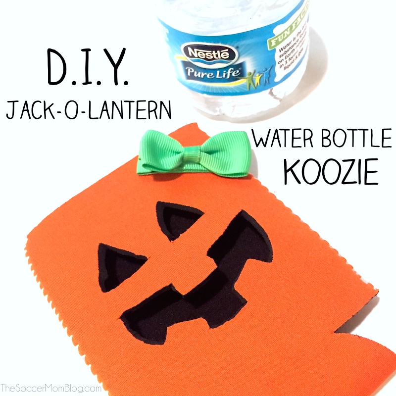 bottle cookie decorated to look like a jack-o-lantern