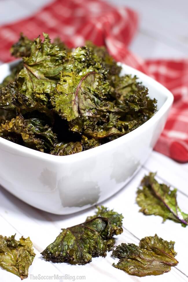Crispy, salty, & a touch of sweet — these Baked Purple Kale Chips are so tasty you might just eat the whole batch! (But don't worry, they're good for you!)