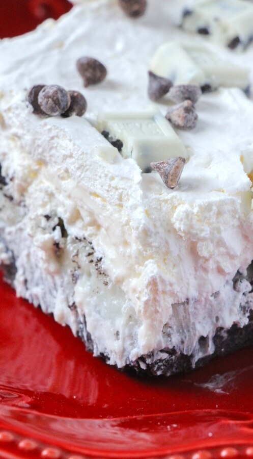 This luscious no-bake Cookies & Cream White Chocolate Lasagna is the dessert dreams are made of - it's always a hit at the party & no baking required!