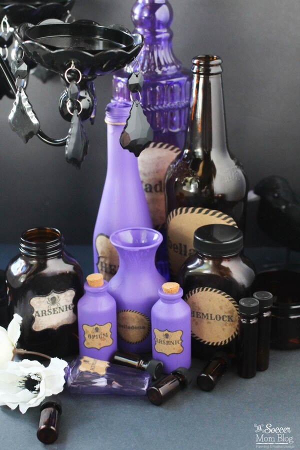 These DIY Halloween Potion Bottles are the perfect spooky touch to your party decor! Easy step-by-step tutorial and free printable labels included!