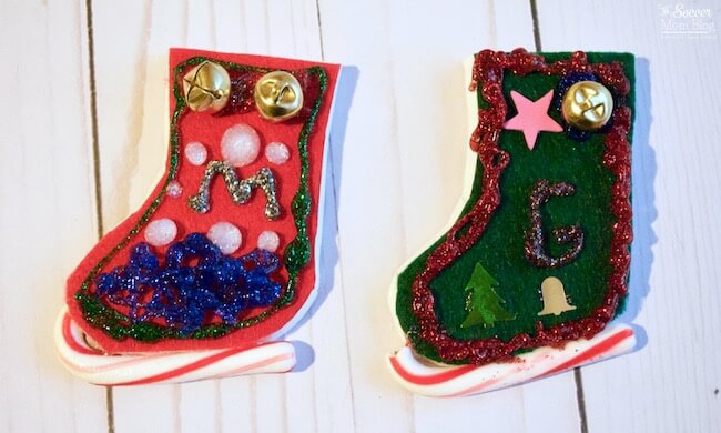 Your kids will have a blast making these Candy Cane Ice Skate Ornaments! The perfect simple Christmas craft for home or the classroom.