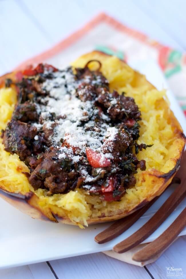 This colorful, flavorful healthy Italian Roasted Spaghetti Squash with Sausage & Kale tastes even better than pasta! (Paleo, gluten-free, low-carb)