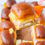 Our favorite recipe for Hawaiian Sliders - rich, cheesy, and easy to make! The perfect game day party appetizer! Plus tips for throwing a fabulous super bowl party on a budget!