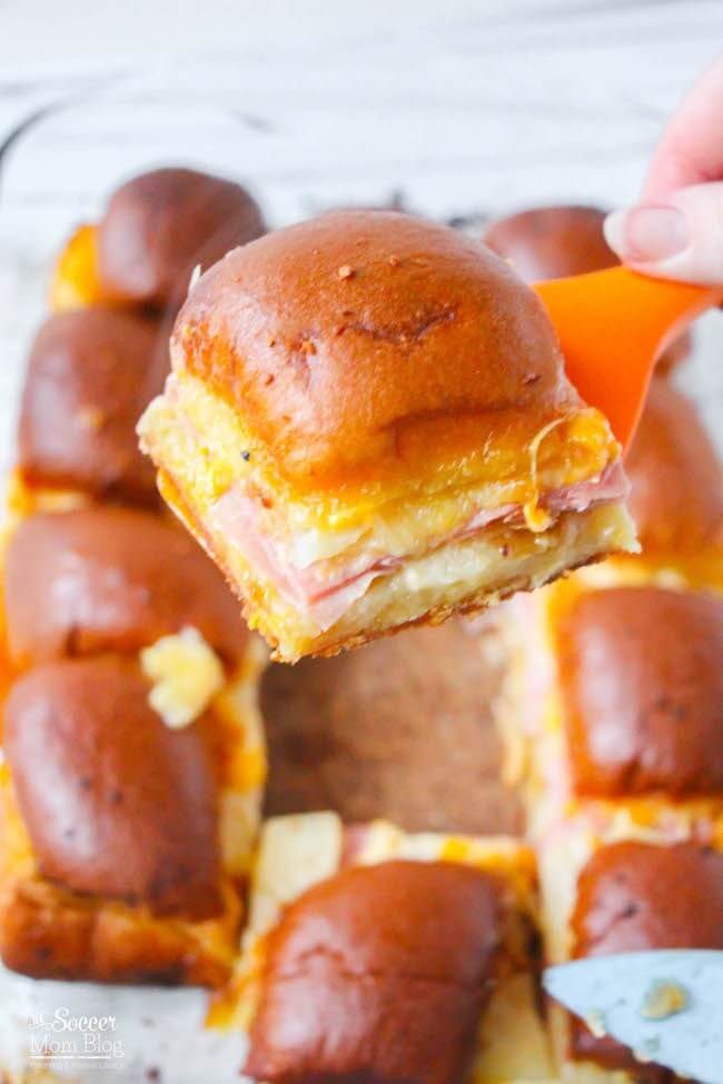 spatula serving a ham and cheese slider