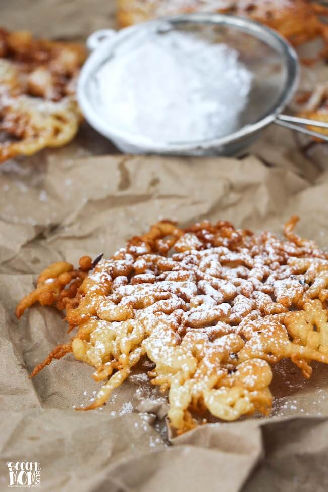 A classic funnel cake recipe that's crispy on the outside and soft and fluffy on the inside...you'd never believe they're actually gluten free!