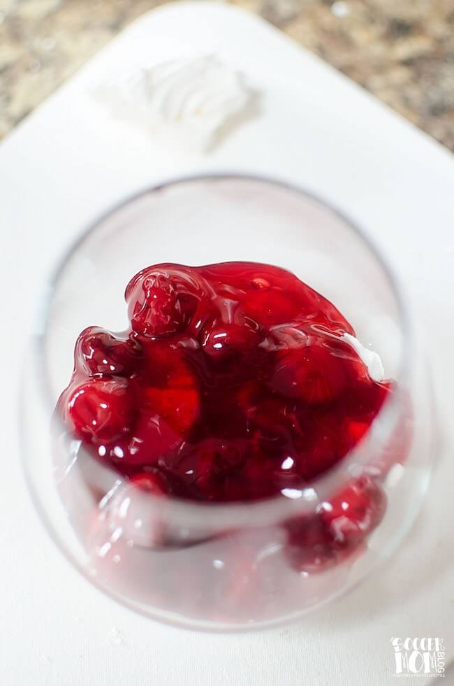 This light, yet luscious Cherry Berry Parfait is a fun & easy summer dessert. A gorgeous red, white, & blue layered treat perfect for a 4th of July party.