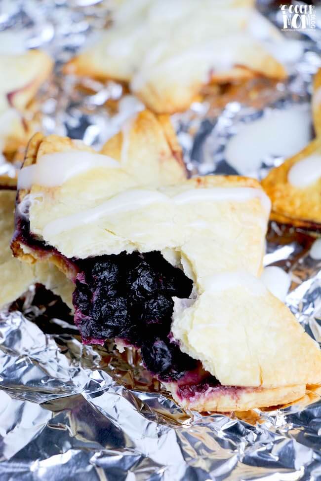 These Blueberry & Strawberry Star Hand Pies are the perfect patriotic dessert for your 4th of July party or grab-and-go treat for your summer BBQs!