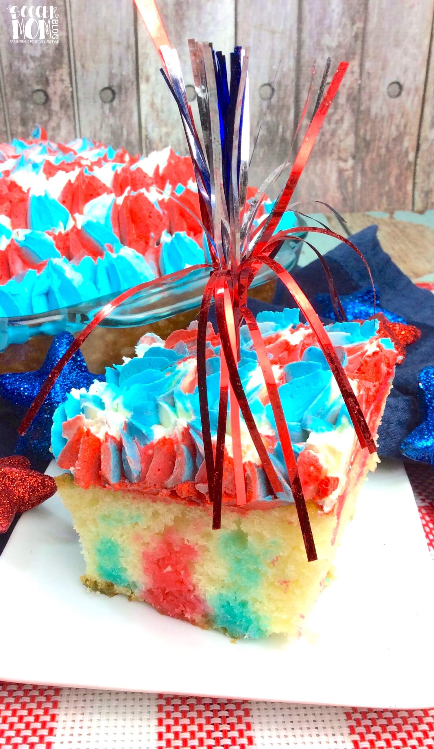 This stunning Red White & Blue Jello Poke Cake is guaranteed to be the star of the party! The perfect patriotic dessert for Memorial Day or the 4th of July.