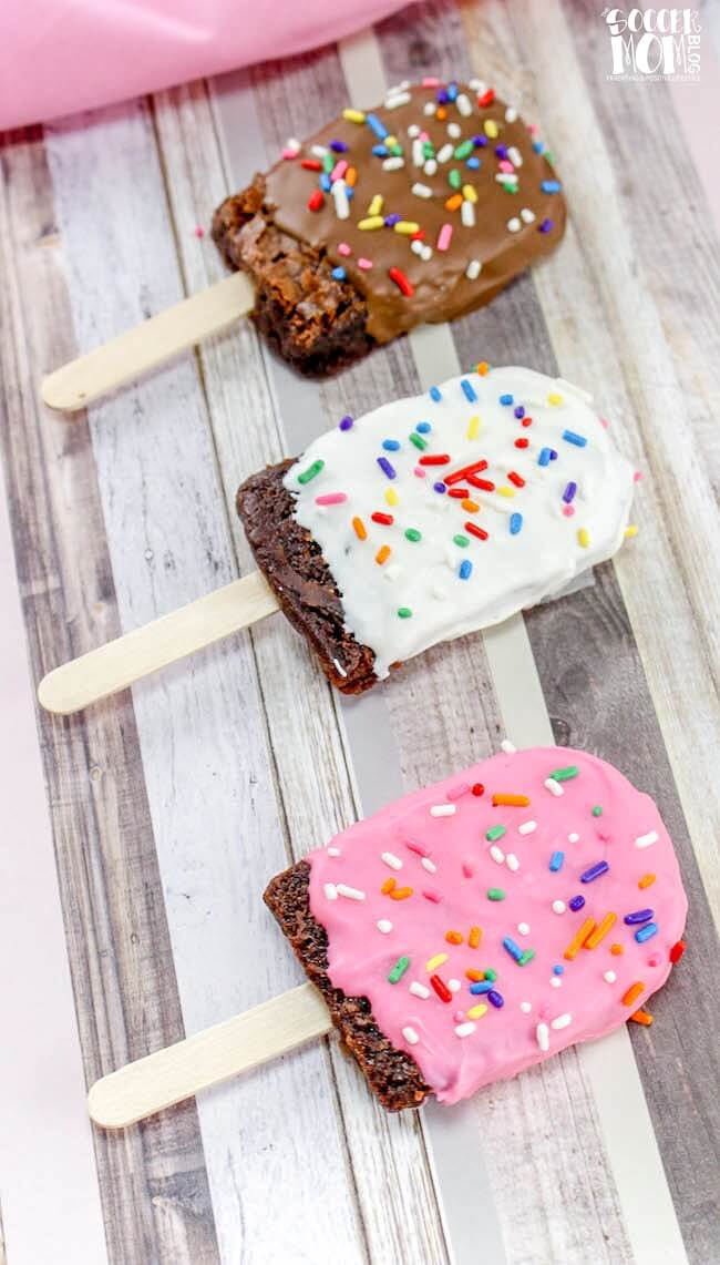 brownies dipped in chocolate on a stick to look like popsicles