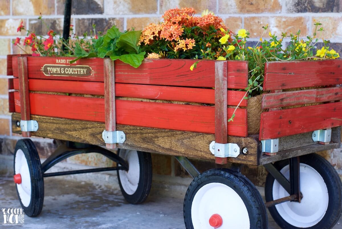 garden planter made with a vintage red wagon