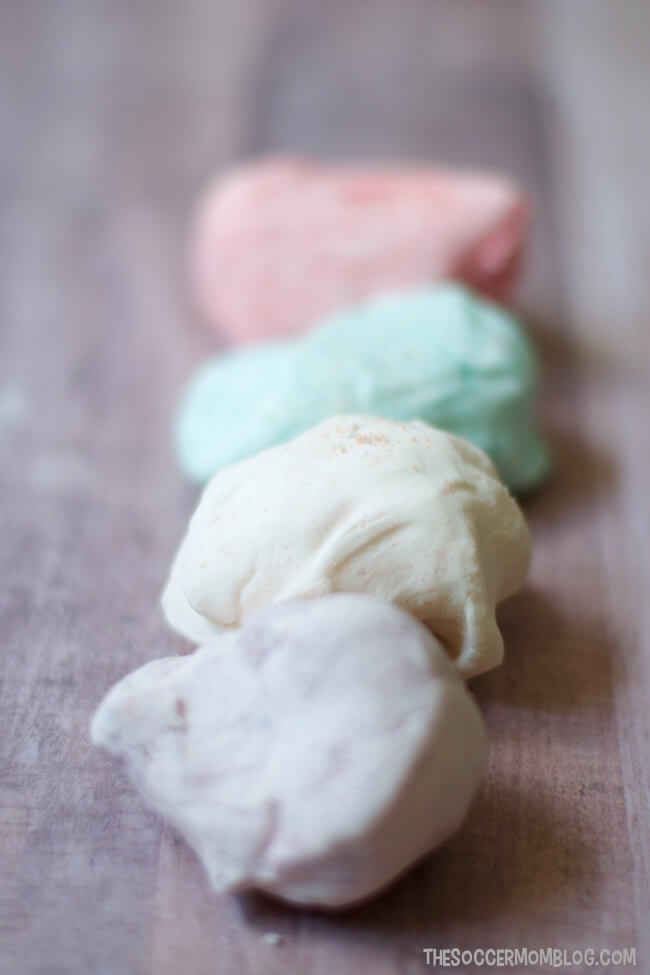 This colorful, scented, edible, all-around amazing Unicorn Poop Play Dough recipe is a sensory play experience that your kids will love!