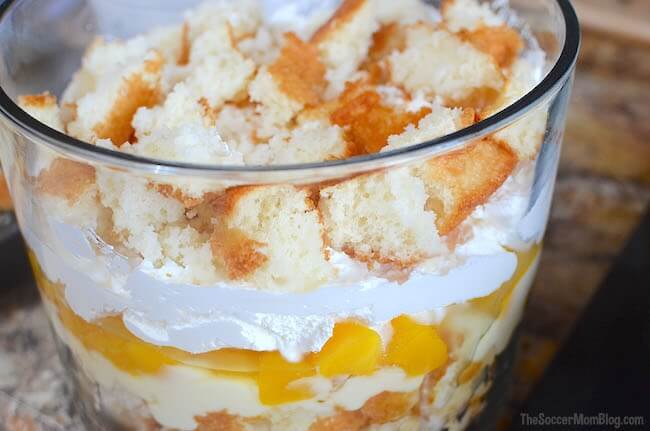 This Vanilla Pecan Peach Trifle is a total show-stopper, but it's actually pretty easy to make (especially with a few box mix "cheats")
