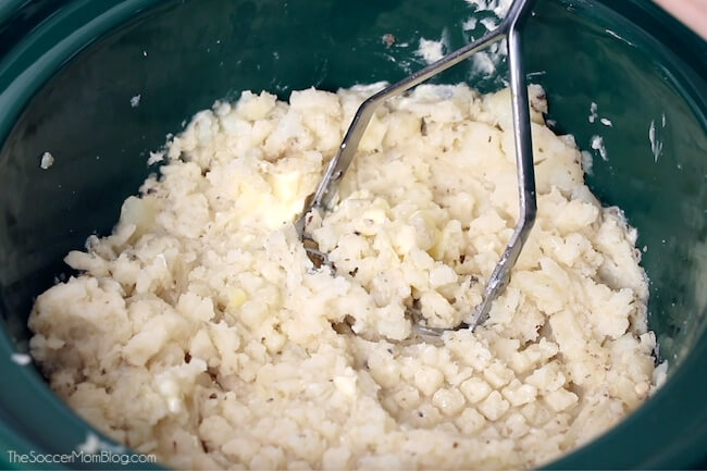 mashing potatoes in a slow cooker