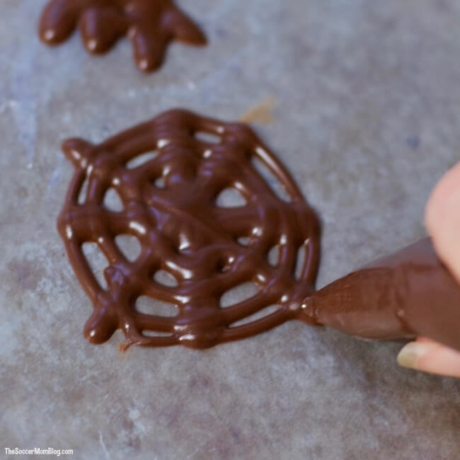 drawing chocolate spiderweb cupcake toppers