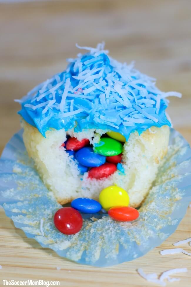 Make your birthday superstar's special day even more magical with these fun & festive piñata cupcakes! A super easy kids party recipe they'll LOVE!