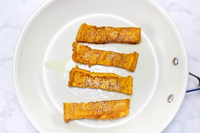 The ultimate Fall breakfast!! These delightful Pumpkin French Toast Sticks will totally make you feel all warm and fuzzy inside!