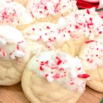 Candy Cane Cookies: Soft sugar cookies dipped in rich white chocolate and crushed peppermint candies. A wintery tasting treat and one of our favorite Christmas cookie recipes!