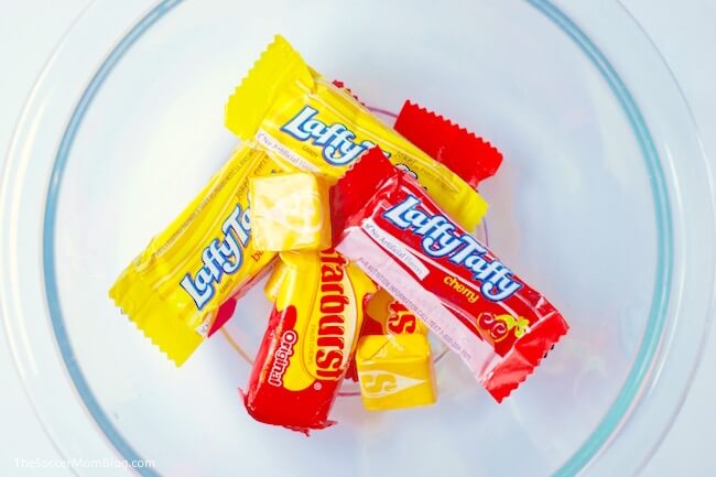 Starburst candy in a clear bowl