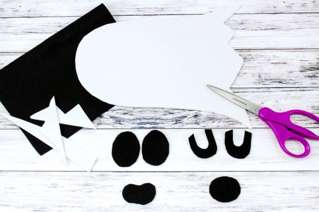 This fridge magnet ghost craft is a fun decoration to make with kids. They'll have a blast switching the pieces around to make lots of goofy ghost faces!