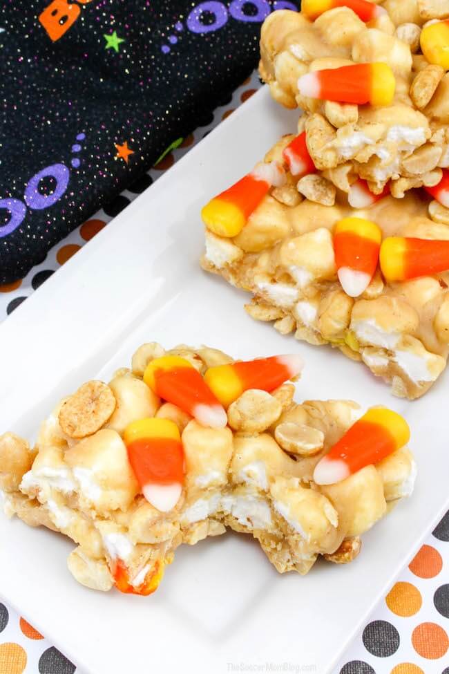 candy corn bars on plate with bite missing