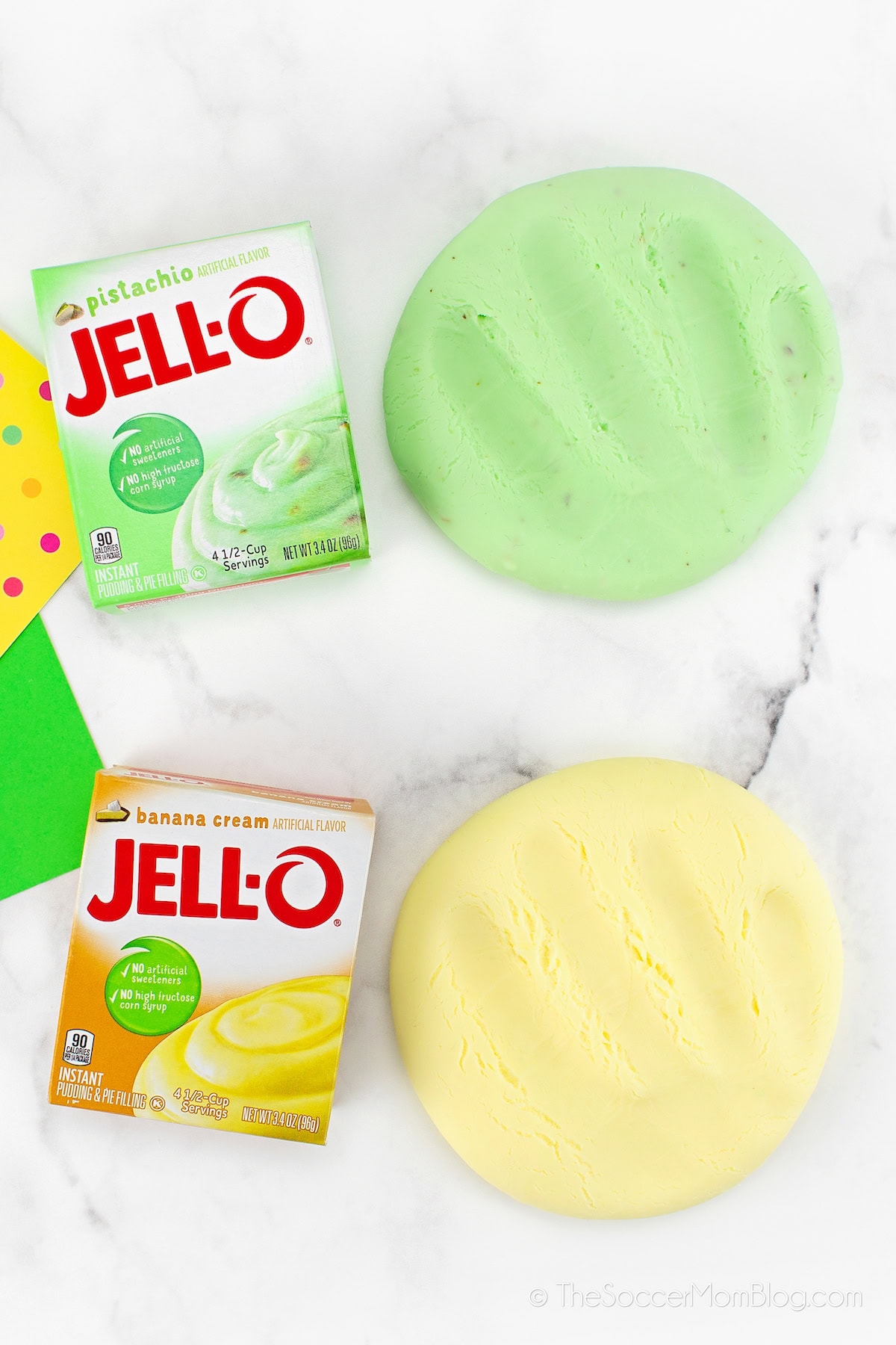 green and yellow playdough and boxes of jello pudding.