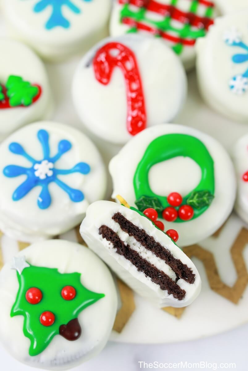 decorated Christmas oreos with trees, candy canes, wreaths, etc.