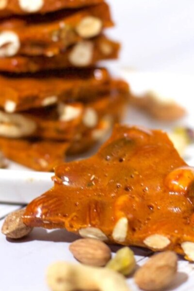 A lot of dessert recipes claim to "melt in your mouth," but this luscious homemade nut & honey candy really does live up to that promise!!