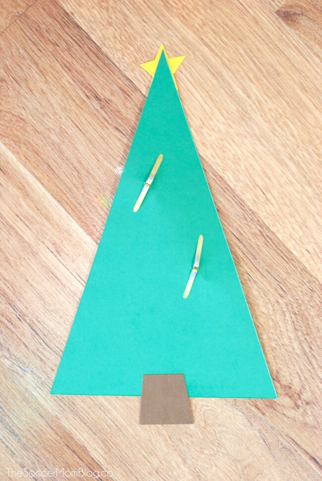 This kid-made photo Christmas tree card is a keepsake that friends and family will treasure for years to come! Easy paper craft with simple supplies.
