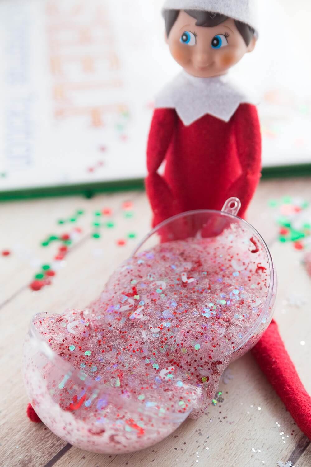 elf on the shelf with sparkly glitter slime