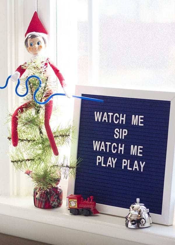 Elf on the Shelf with letter board "Watch Me Sip Watch Me Play Play"