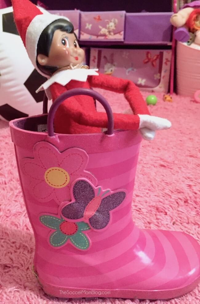 Elf on the Shelf doll in a child's rain boot