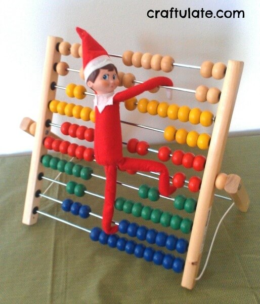elf climbing on an abacus