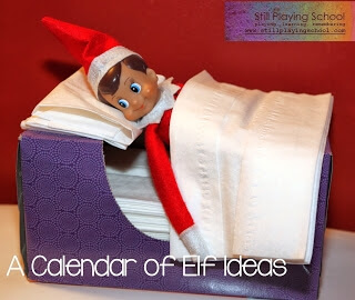 Elf taking a nap in a tissue box