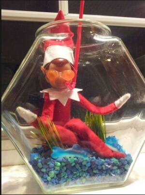 elf in a fishbowl with snorkel