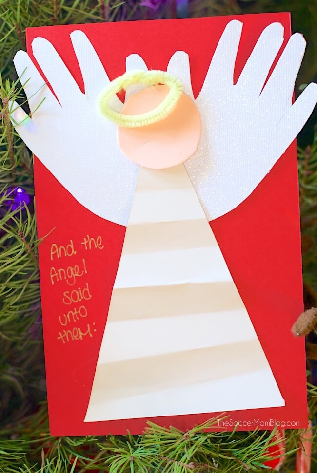 Spread good tidings with this adorable kid-made Handprint Angel Christmas Card! Easy keepsake kids paper craft using simple supplies.