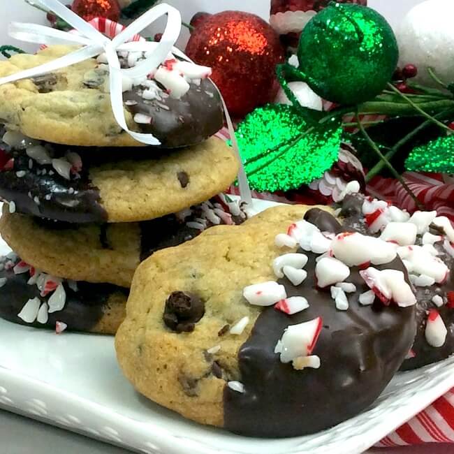 These Chocolate Dipped Peppermint Chocolate Chip Cookies take a classic cookie recipe and make it SO much better! A peppermint mocha lover's dream!
