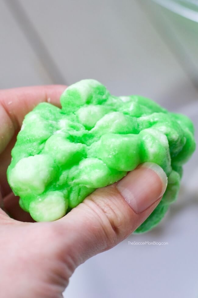 floam slime made with marshmallows and jello squished in hand