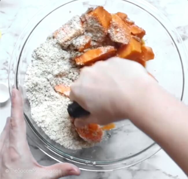 mashing sweet potatoes with almond flour and spices