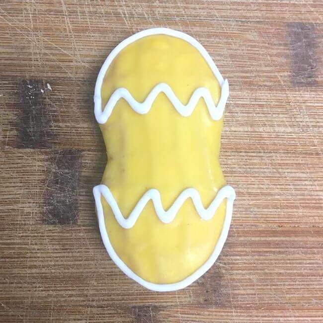 Decorating Nutter Butter cookies to look like baby chicks for Easter