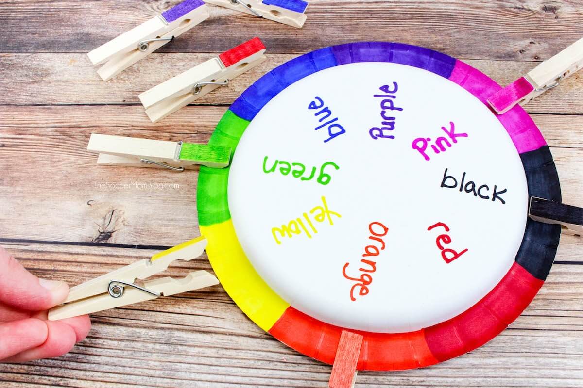 This DIY color matching game for toddlers is a clever way to practice color recognition. This educational craft is super easy and kids can help make it with 3 simple household supplies. Helpful way to teach preschoolers their color words.
