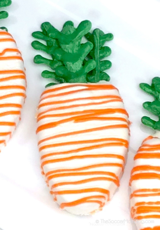 mini carrot cake shaped like a carrot and decorate with orange and green frosting