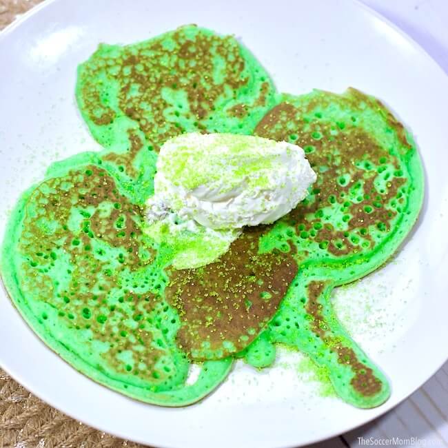 You won't believe how easy it is to make fun and festive Shamrock Pancakes for St. Patrick's Day breakfast! We'll show you the simple shortcut to making BIG 3 or 4-leaf clover shaped pancakes. Kids will LOVE them!