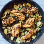 Fried potatoes cooked in Guinness with grilled chicken