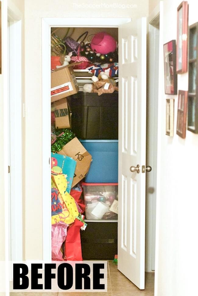 closet packed with boxes and holiday decorations