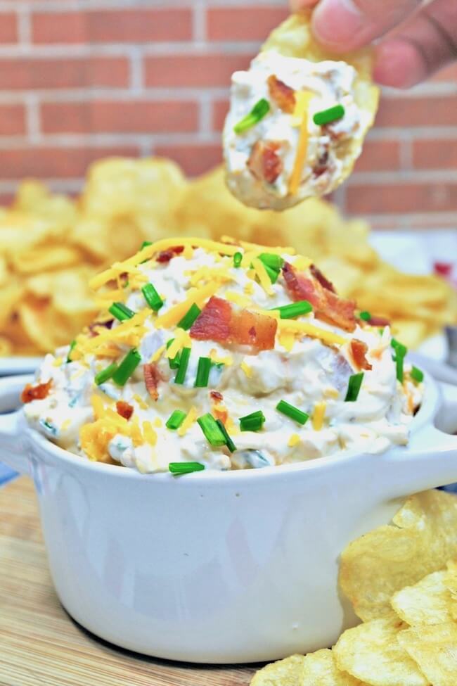 You can whip up this easy loaded baked potato dip in minutes, and it might disappear just as quickly!