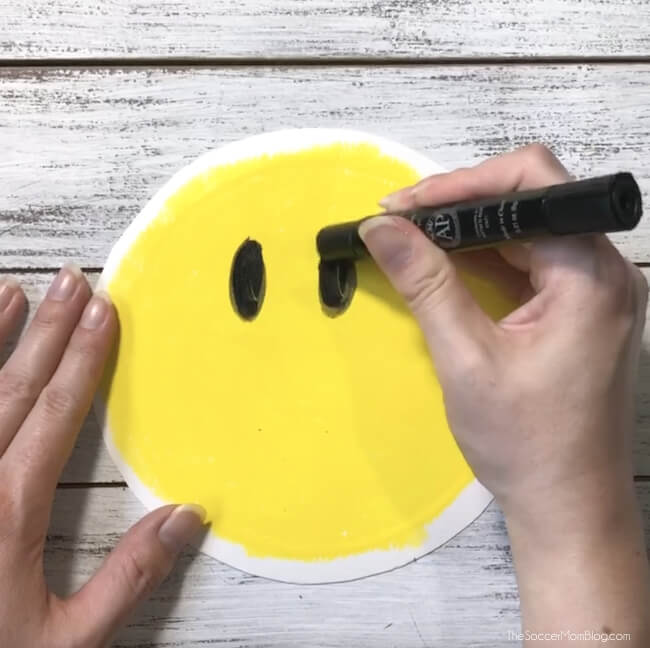 Drawing eyes on a smiley face