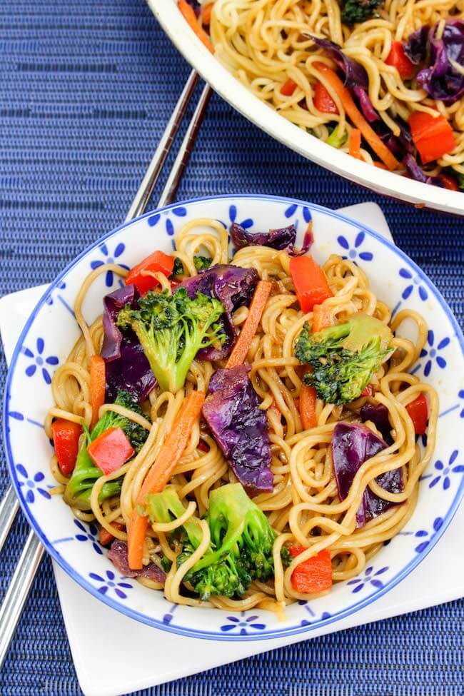 Skip the takeout!! This Easy Vegetable Lo Mein recipe is faster and healthier! Ready in 15 minutes or less, this vegetarian dish is bursting with flavor and vibrant colors. Add your favorite protein to make it an even heartier meal!