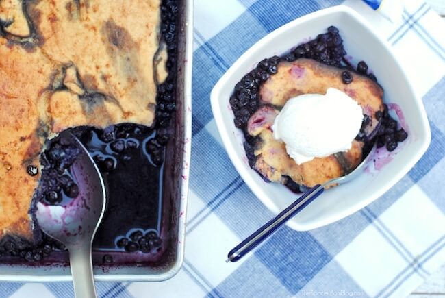 Our favorite family recipe! This fluffy cake-style gluten free blueberry cobbler is a guilt-free version of the classic summer dessert!